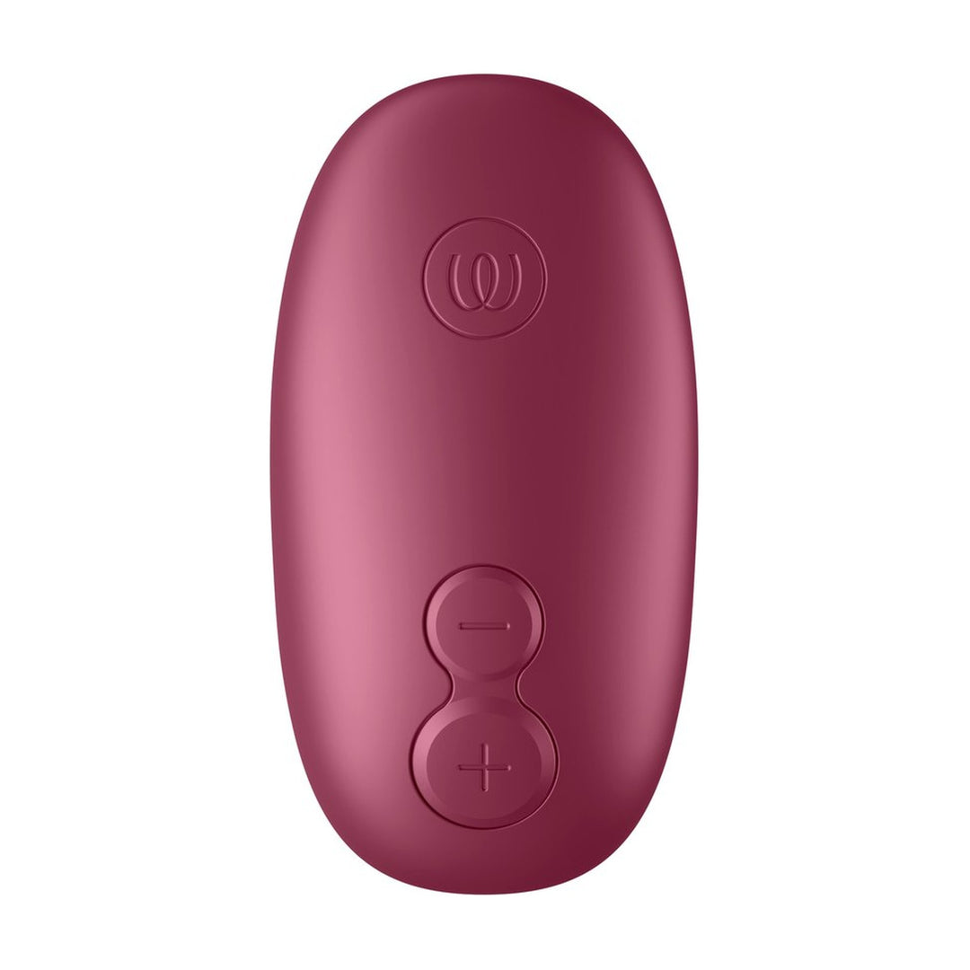 Face supérieure du Womanizer Snap avec ses boutons plus et moins