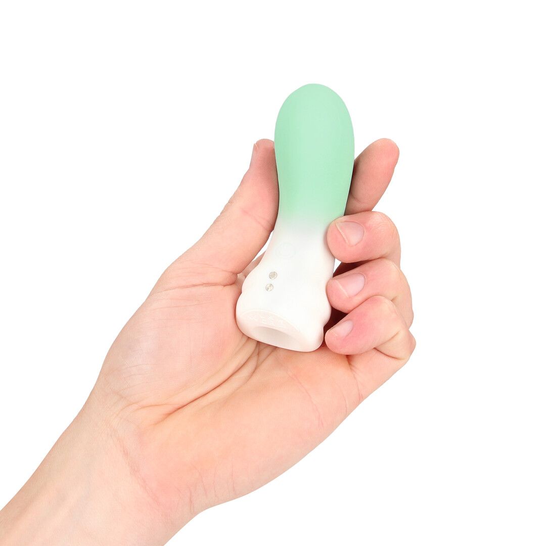 Mini vibromasseur Loveline Smooth Finger tenu dans la main